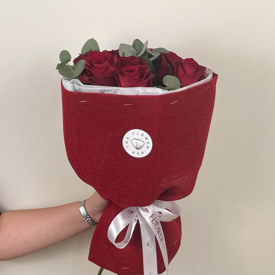 9 Red Roses In Red Wrapping
