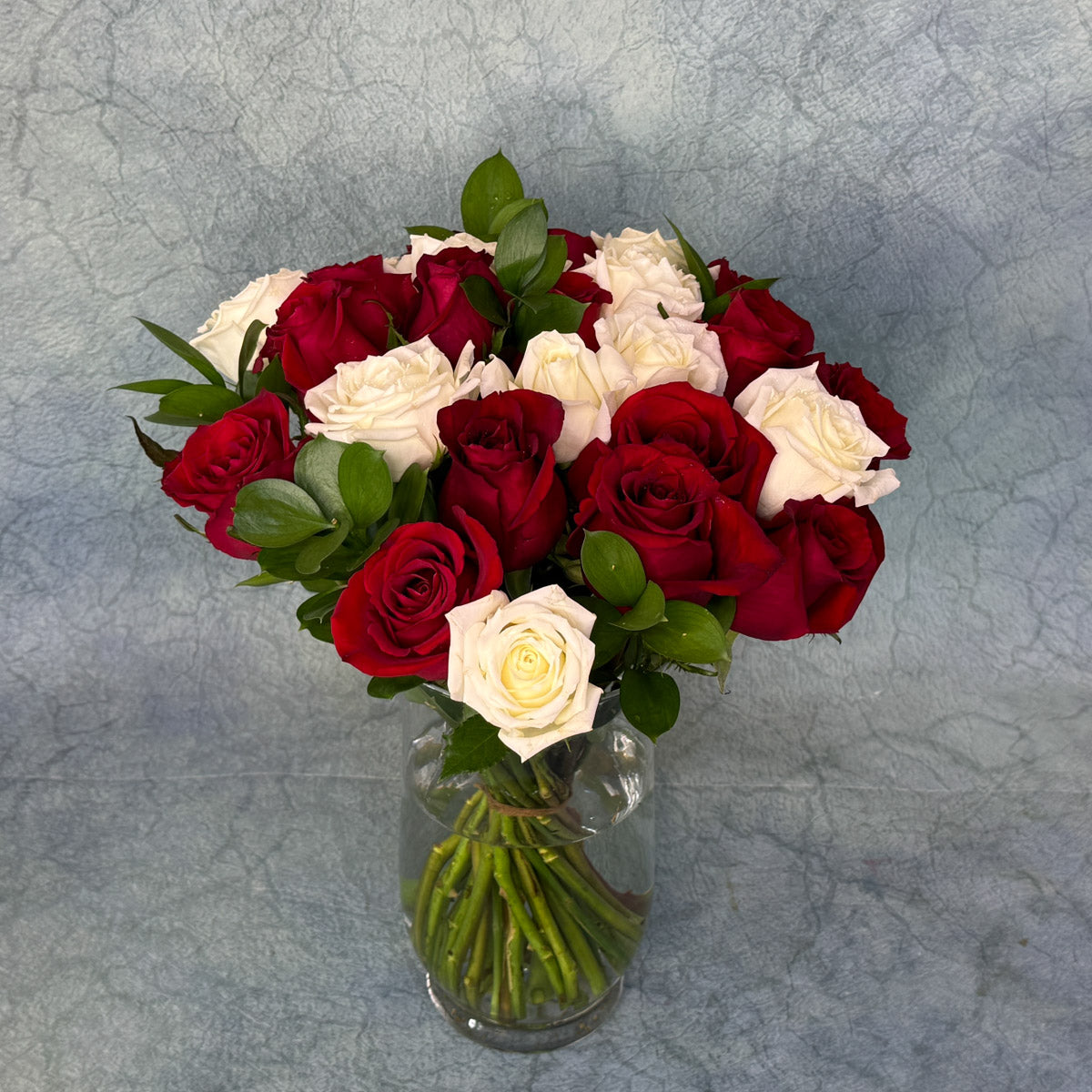 Vase with White and Red Roses