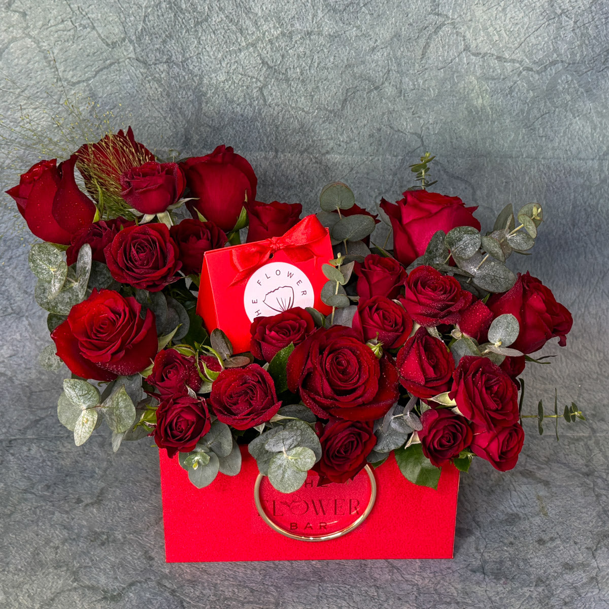 Red Box With Roses and Chocolate