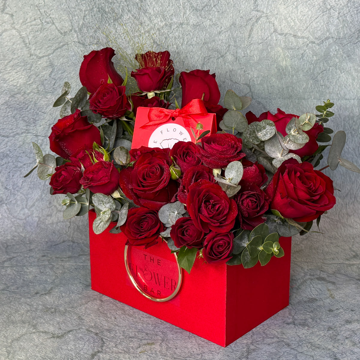 Red Box With Roses and Chocolate