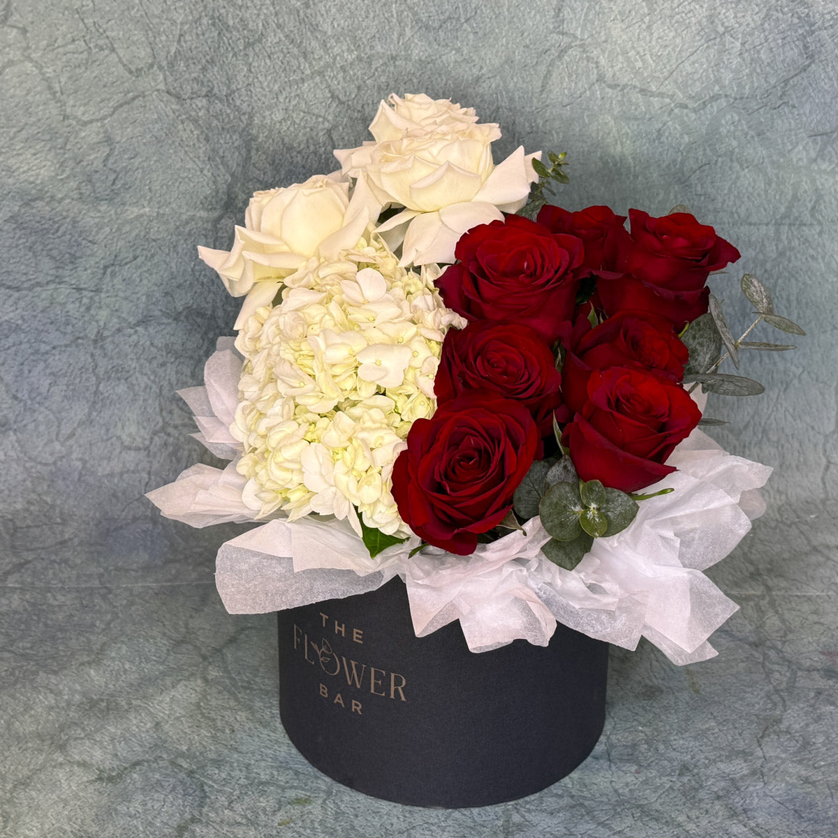 Grey Box with White And Red Flowers