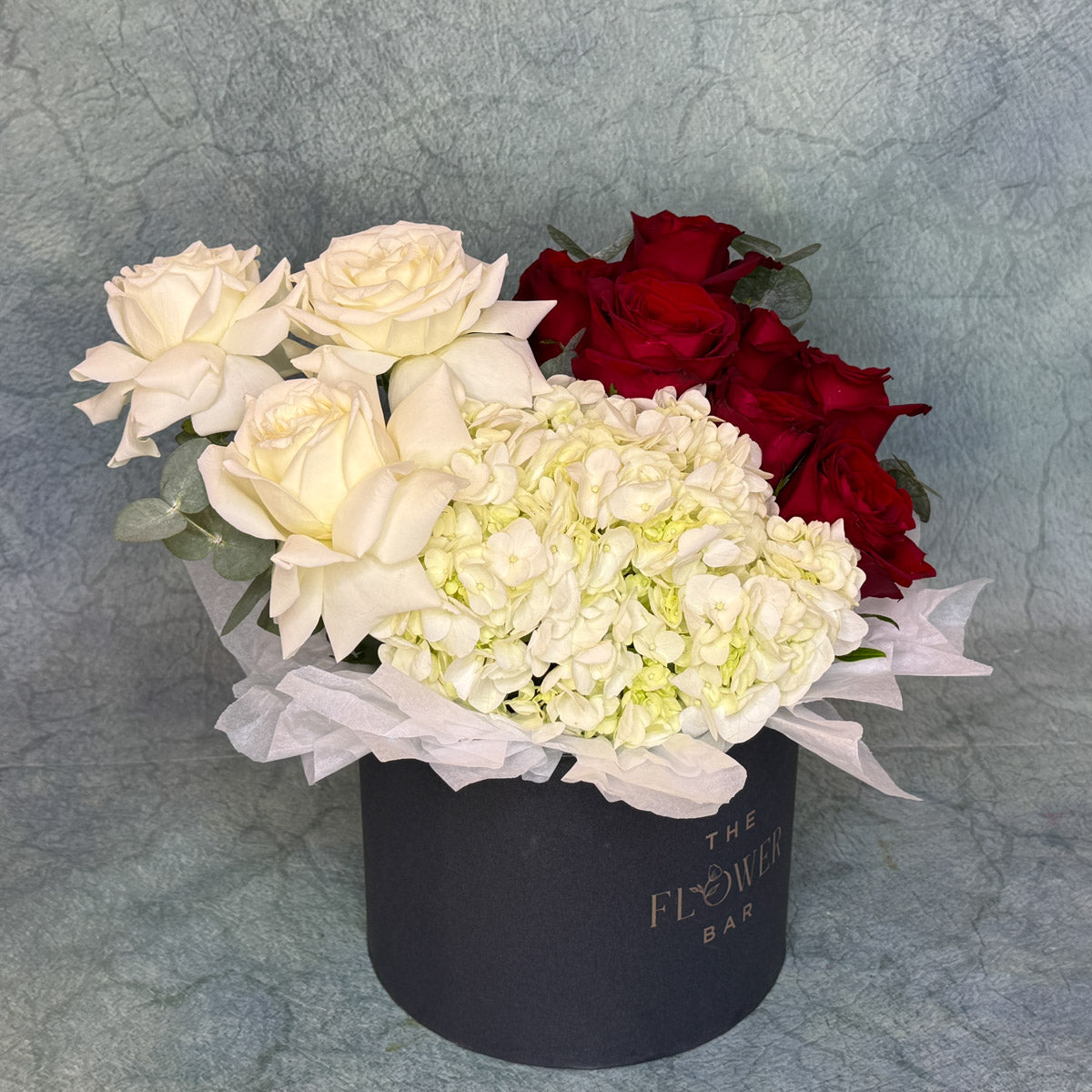 Grey Box with White And Red Flowers