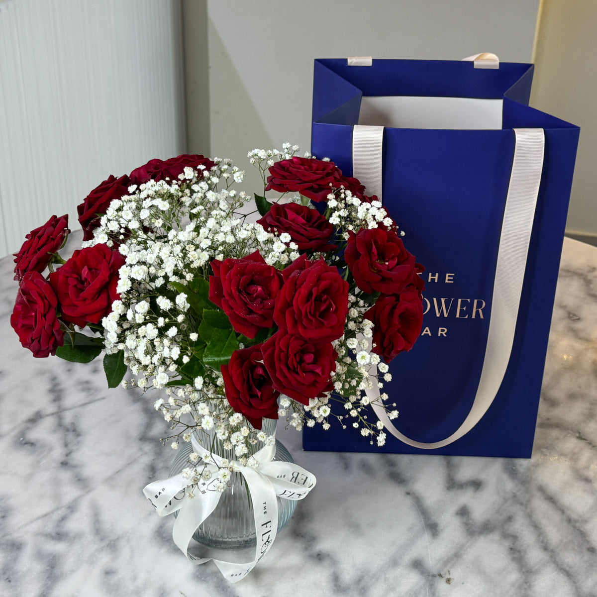 Vase with Spray Roses and Gypsophilia