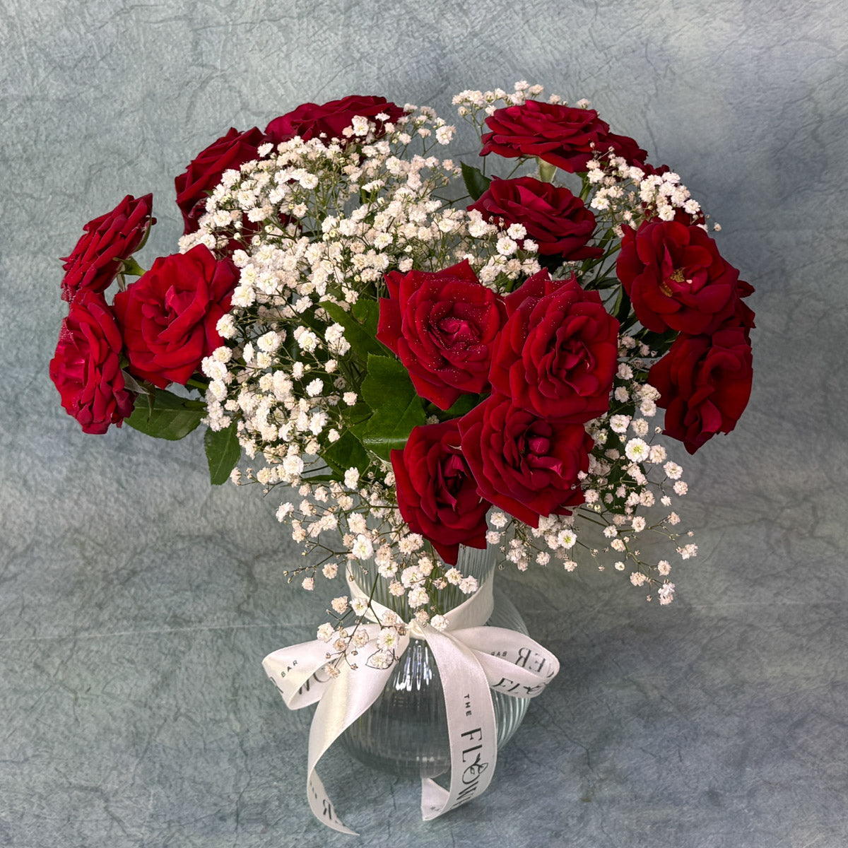 Vase with Spray Roses and Gypsophilia