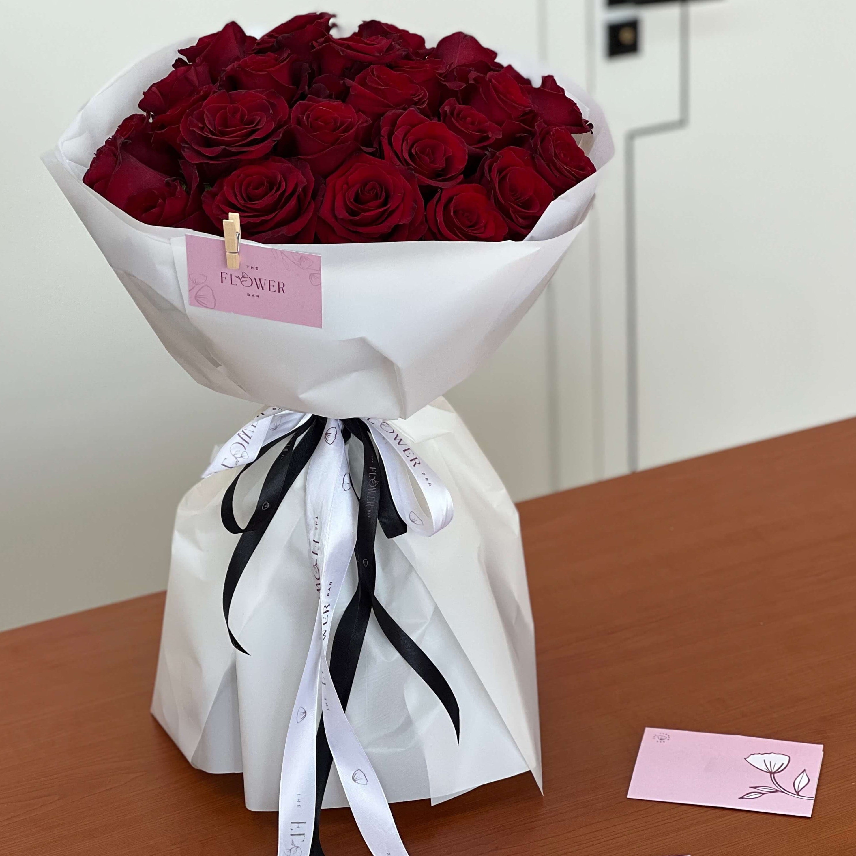 25 Red Roses in White